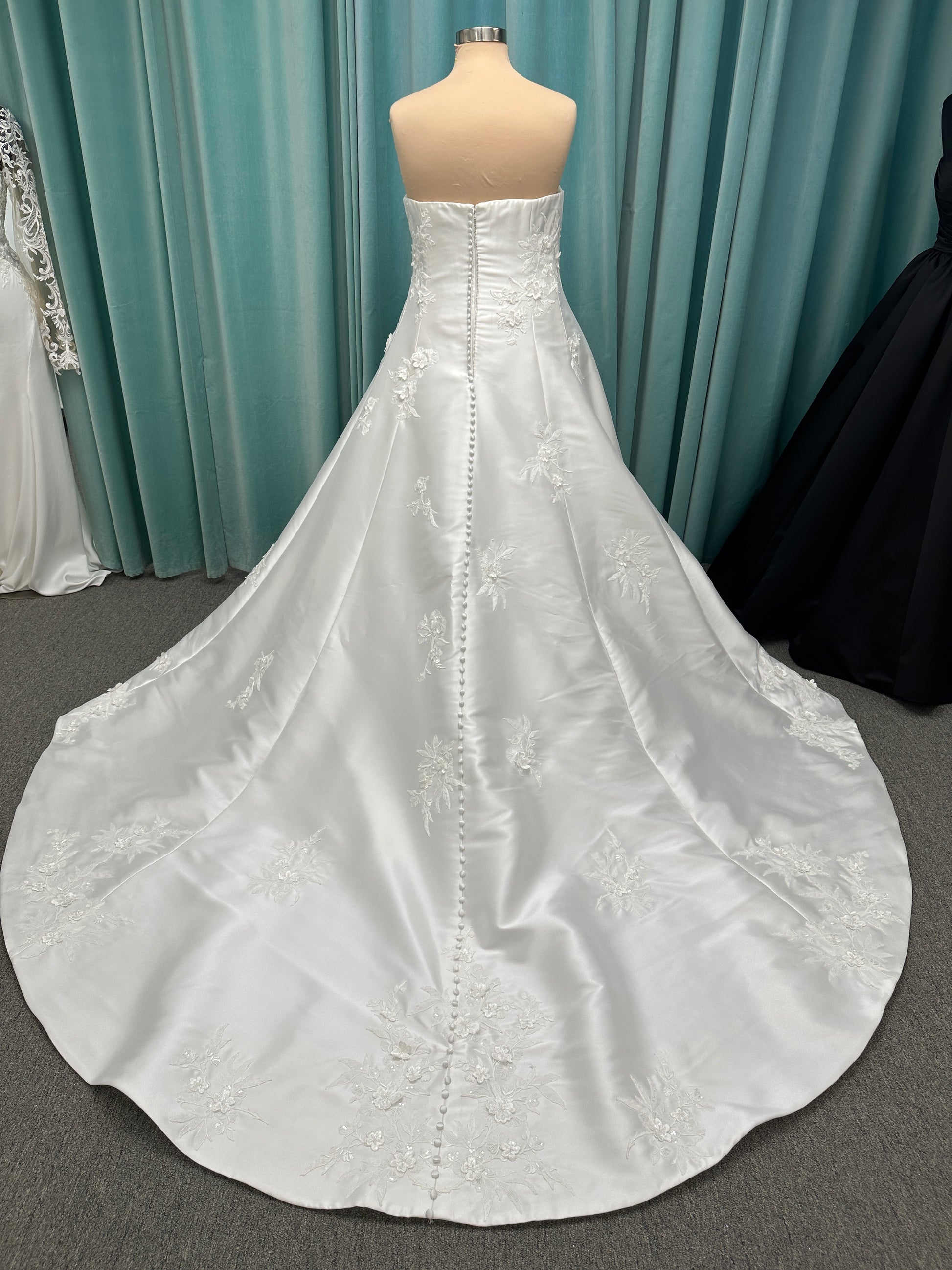 Plus Size Strapless Mikado A-line wedding dress with straight neckline, lace detailing, and full skirt with hip volume by Essense of Australia Style D4479