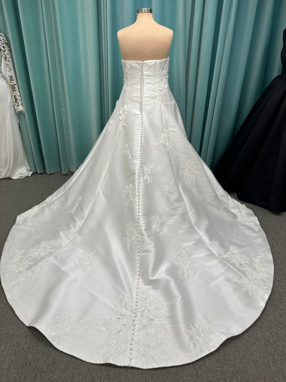 Plus Size Strapless Mikado A-line wedding dress with straight neckline, lace detailing, and full skirt with hip volume by Essense of Australia Style D4479