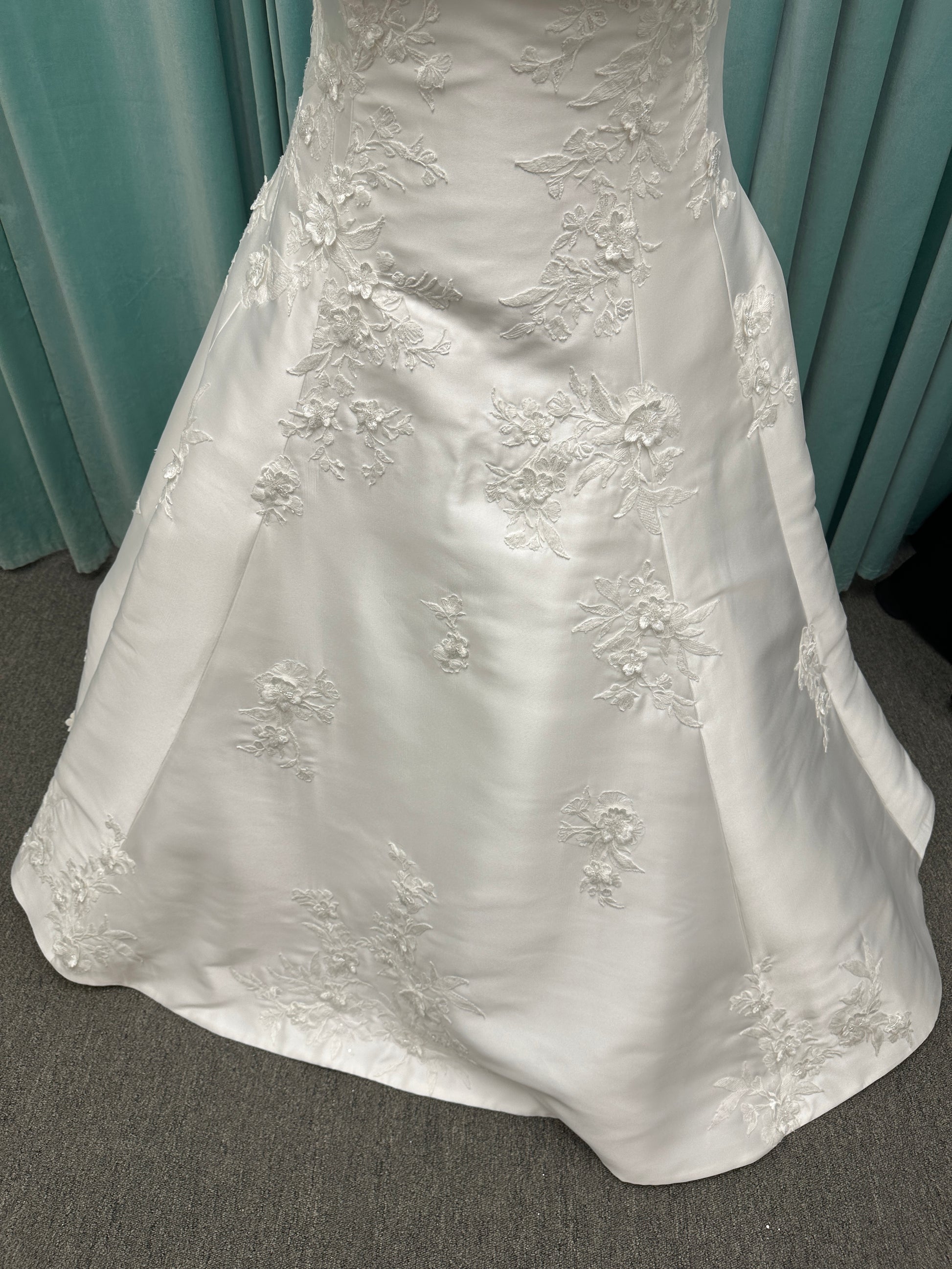 Plus Size Strapless Mikado A-line wedding dress with straight neckline, lace detailing, and full skirt with hip volume by Essense of Australia Style D4479