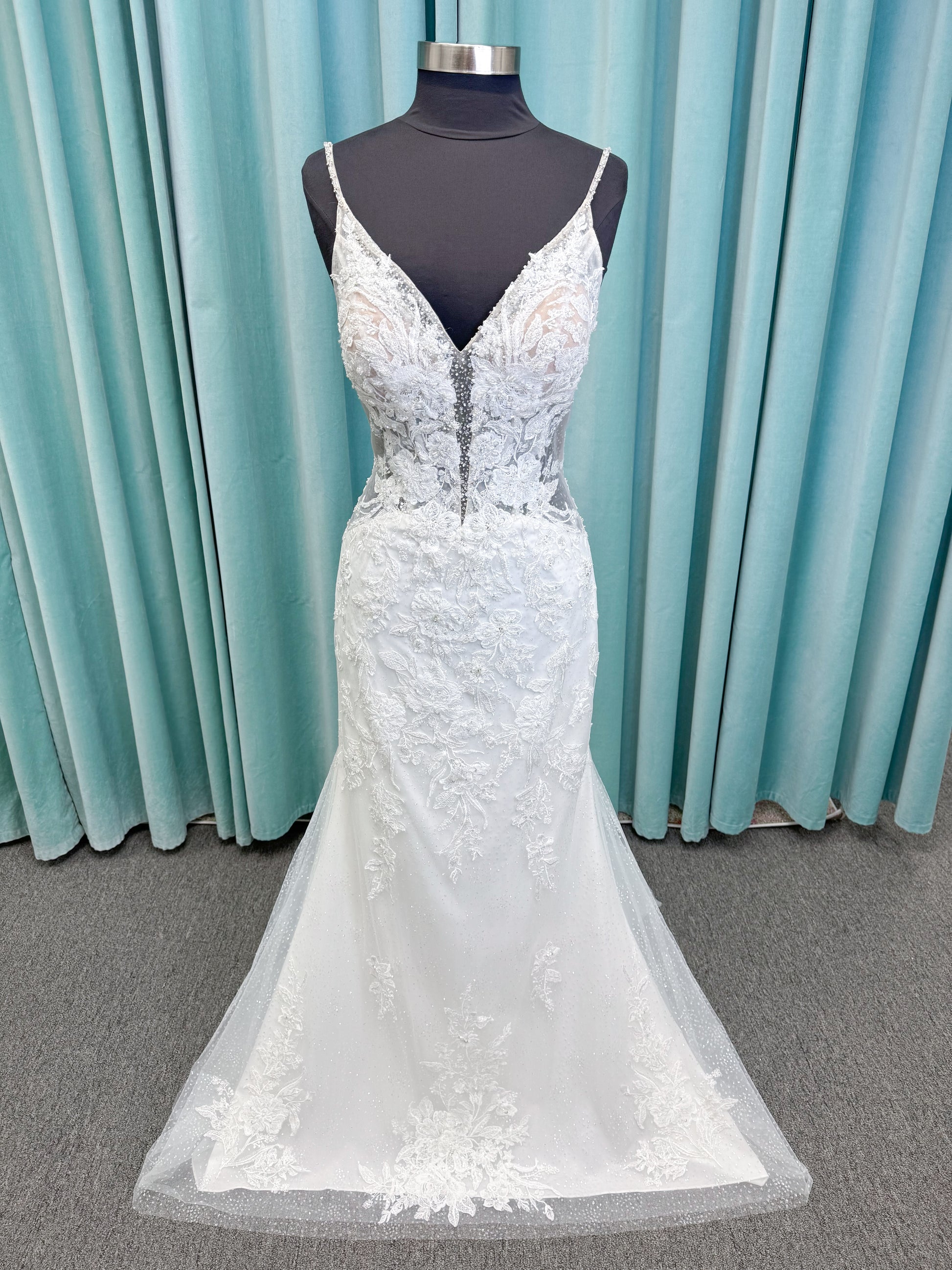 Morilee 2467 Fortunata fit and flare wedding dress with V-neckline, frosted crystal lace appliqués, open beaded back, and sparkle net skirt in Ivory/Cappuccino/Honey.