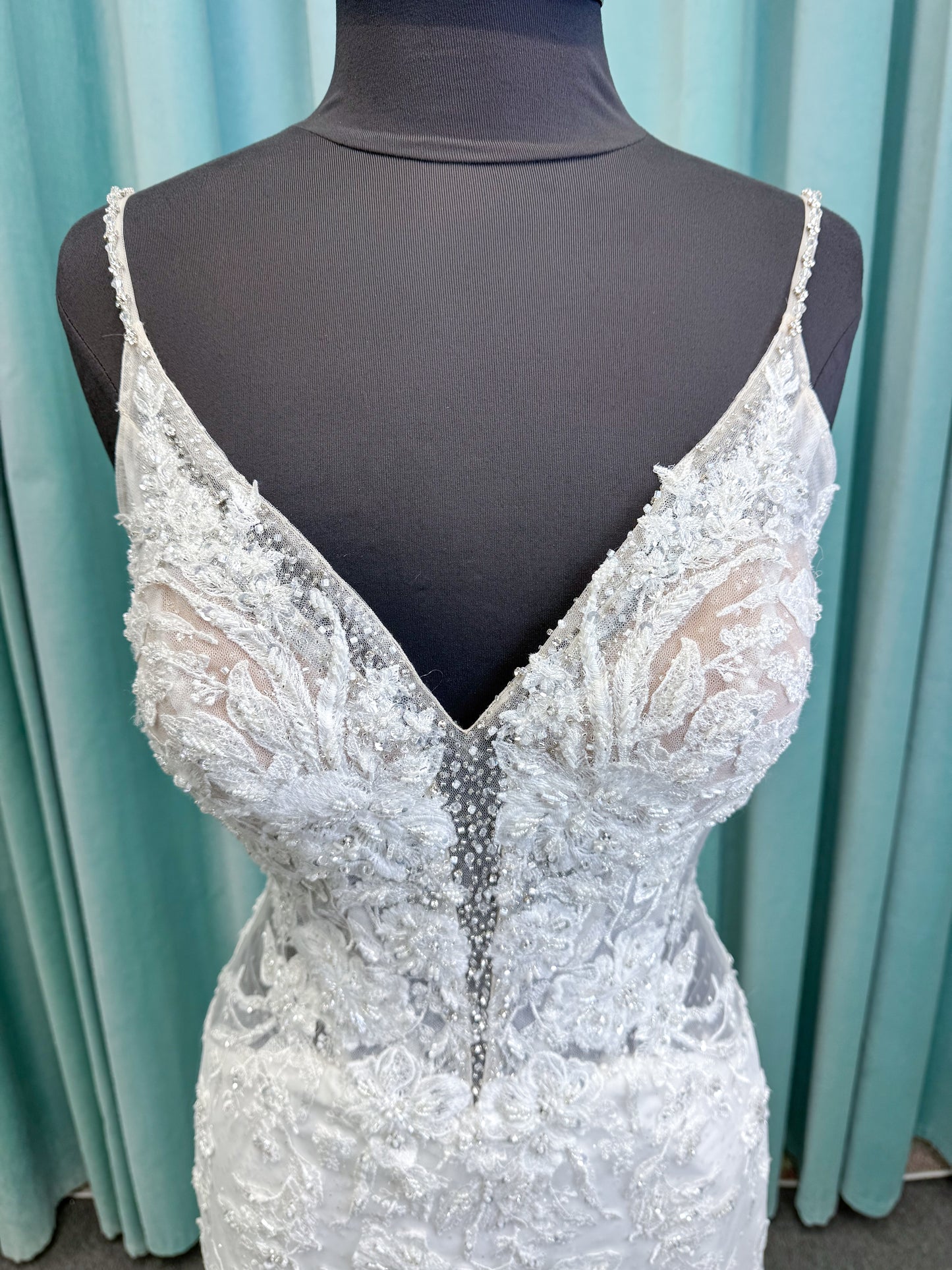 Morilee 2467 Fortunata fit and flare wedding dress with V-neckline, frosted crystal lace appliqués, open beaded back, and sparkle net skirt in Ivory/Cappuccino/Honey.
