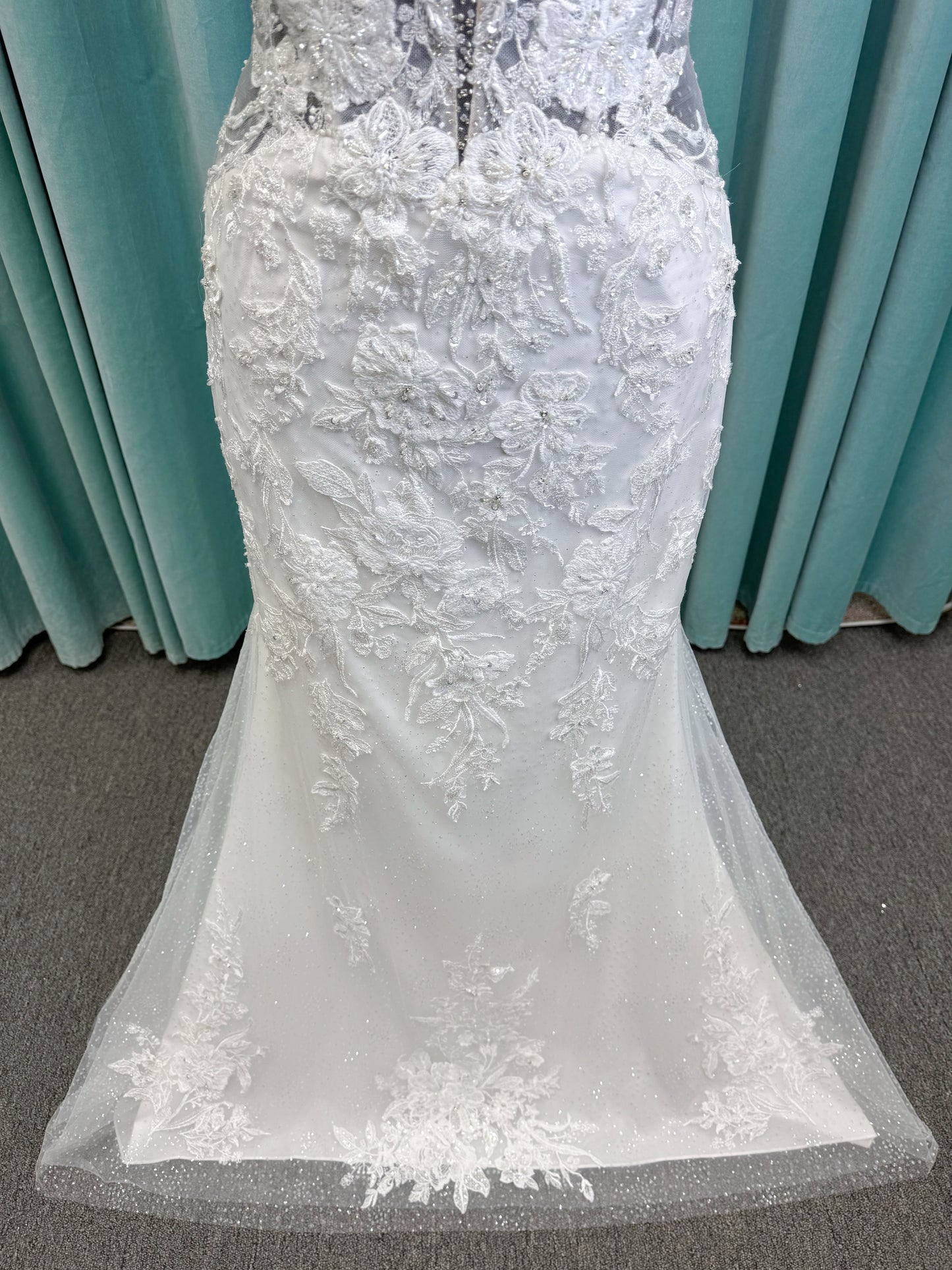 Morilee 2467 Fortunata fit and flare wedding dress with V-neckline, frosted crystal lace appliqués, open beaded back, and sparkle net skirt in Ivory/Cappuccino/Honey.