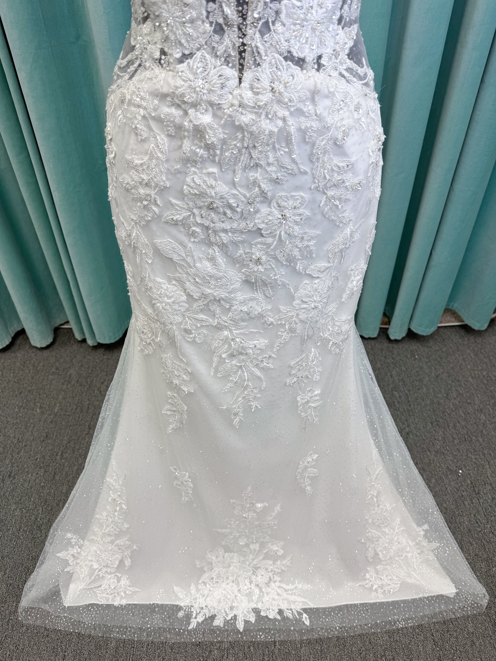 Morilee 2467 Fortunata fit and flare wedding dress with V-neckline, frosted crystal lace appliqués, open beaded back, and sparkle net skirt in Ivory/Cappuccino/Honey.