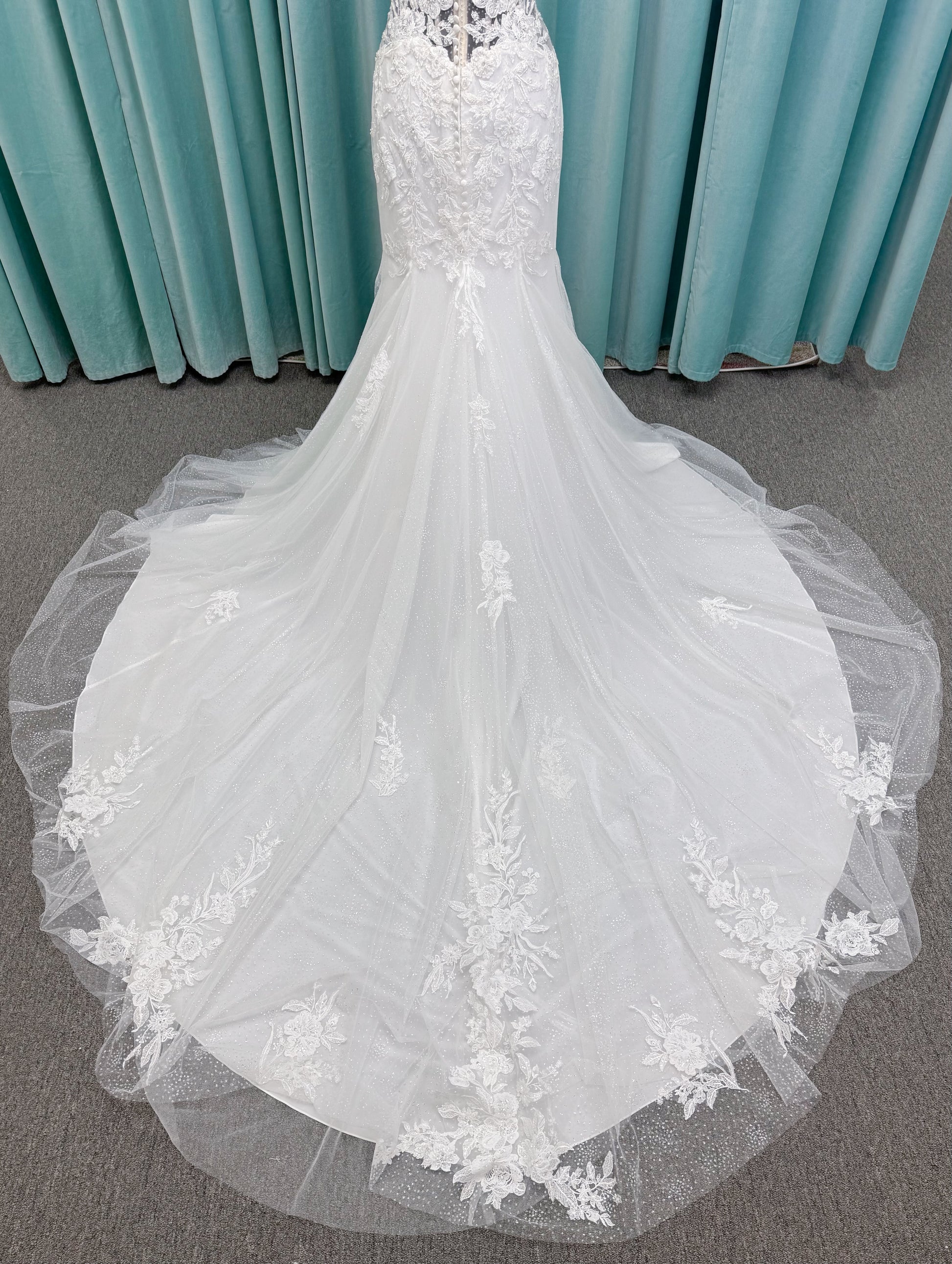 Morilee 2467 Fortunata fit and flare wedding dress with V-neckline, frosted crystal lace appliqués, open beaded back, and sparkle net skirt in Ivory/Cappuccino/Honey.