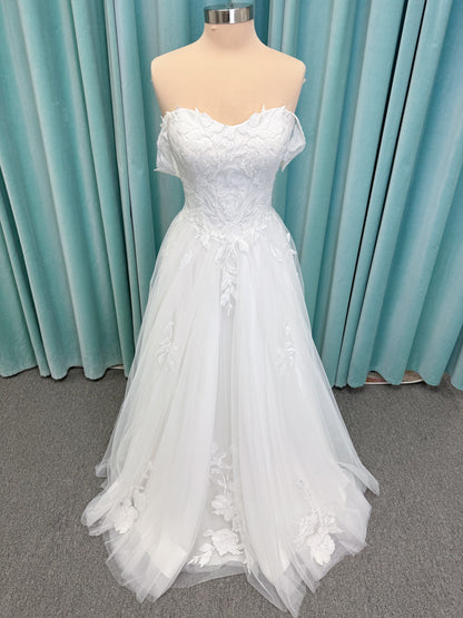 Jeslyn A-line Wedding Dress in Ivory, Size 14 — off-the-shoulder, floral appliqués cascading through tulle