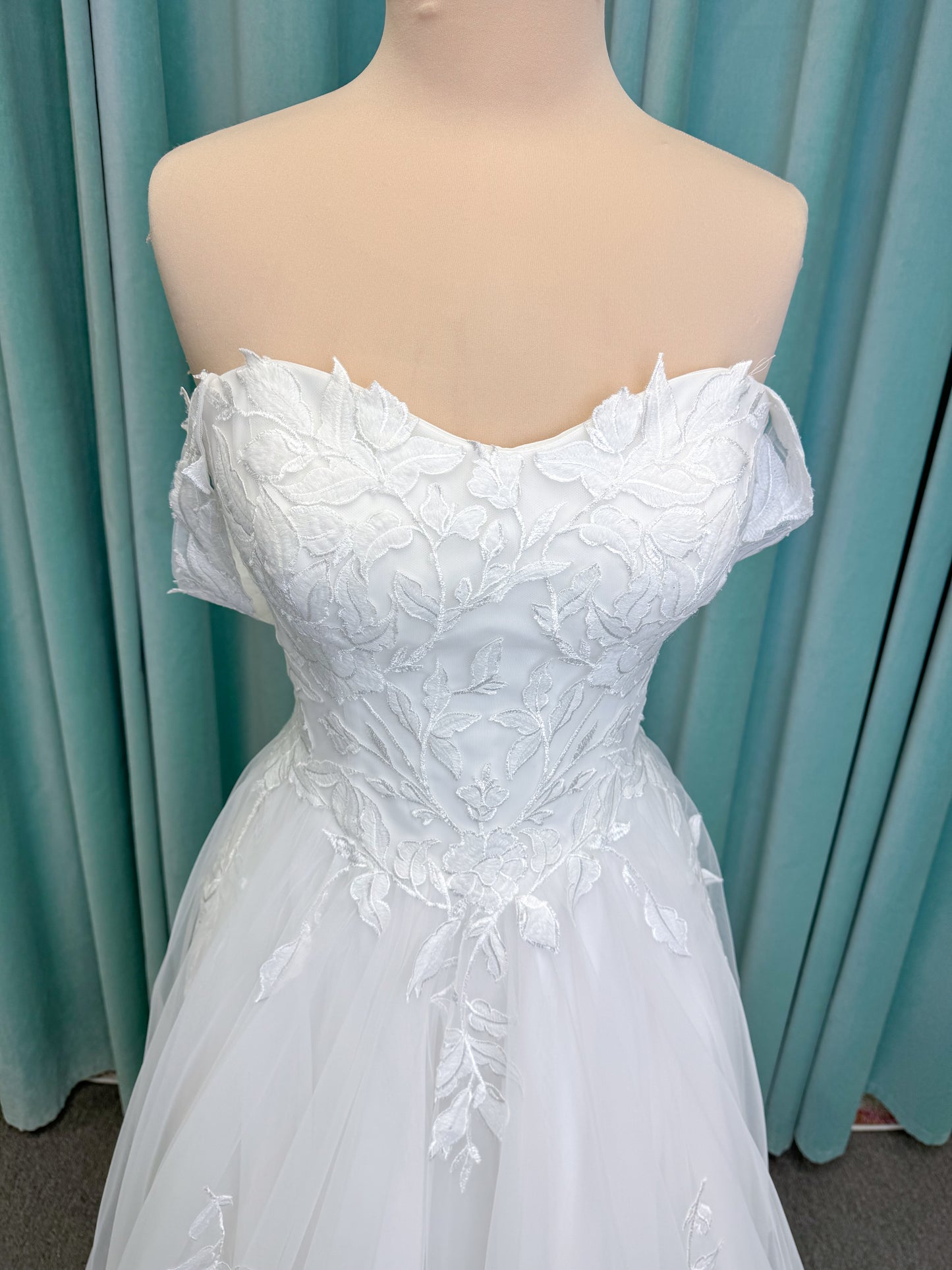Jeslyn A-line Wedding Dress in Ivory, Size 14 — off-the-shoulder, floral appliqués cascading through tulle