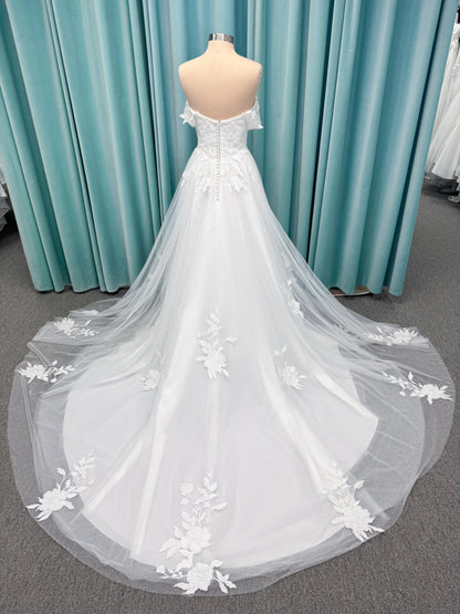 Jeslyn A-line Wedding Dress in Ivory, Size 14 — off-the-shoulder, floral appliqués cascading through tulle