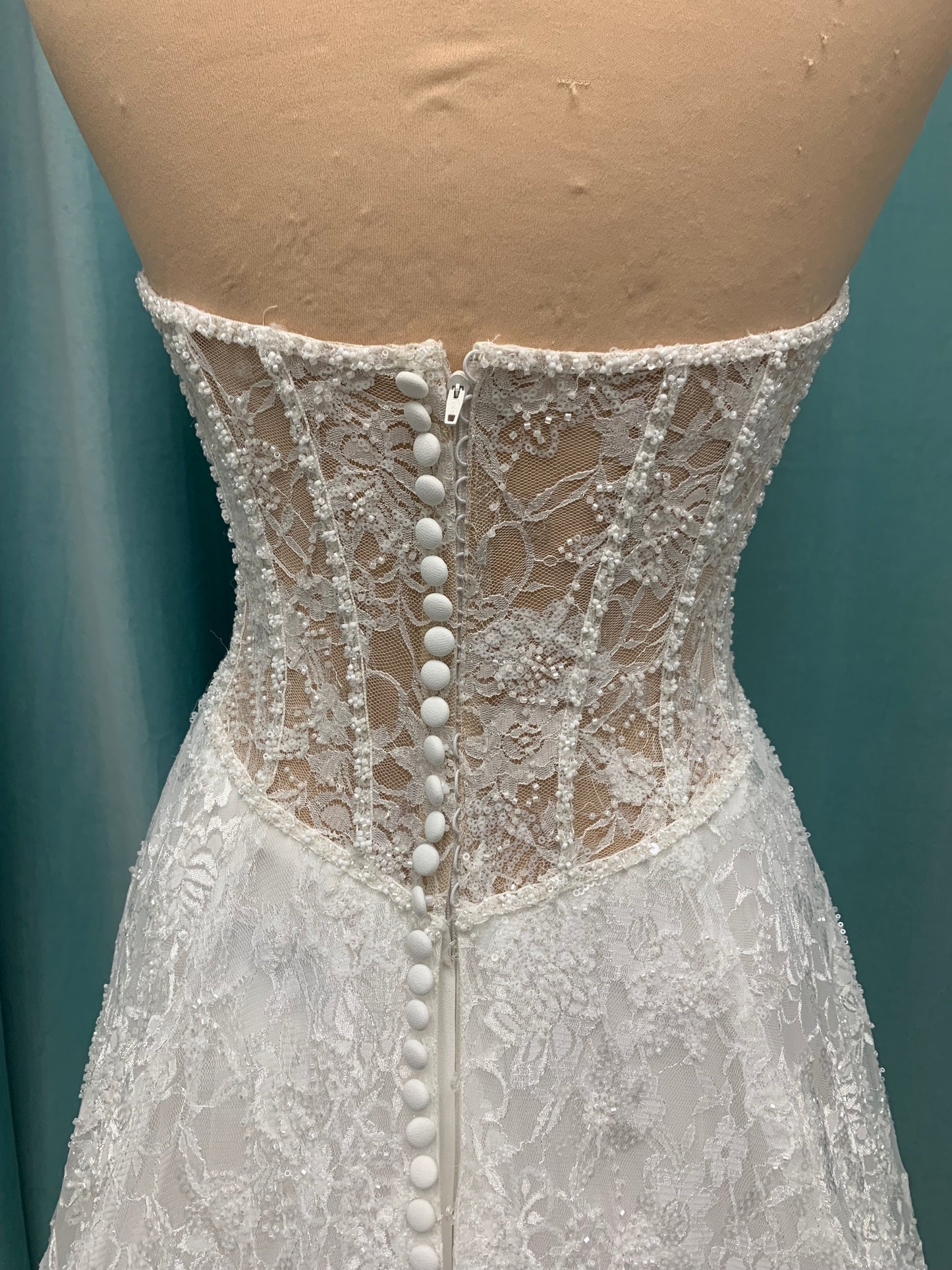 Essense of Australia D4176 strapless sparkling A-line wedding dress with basque waist and high slit