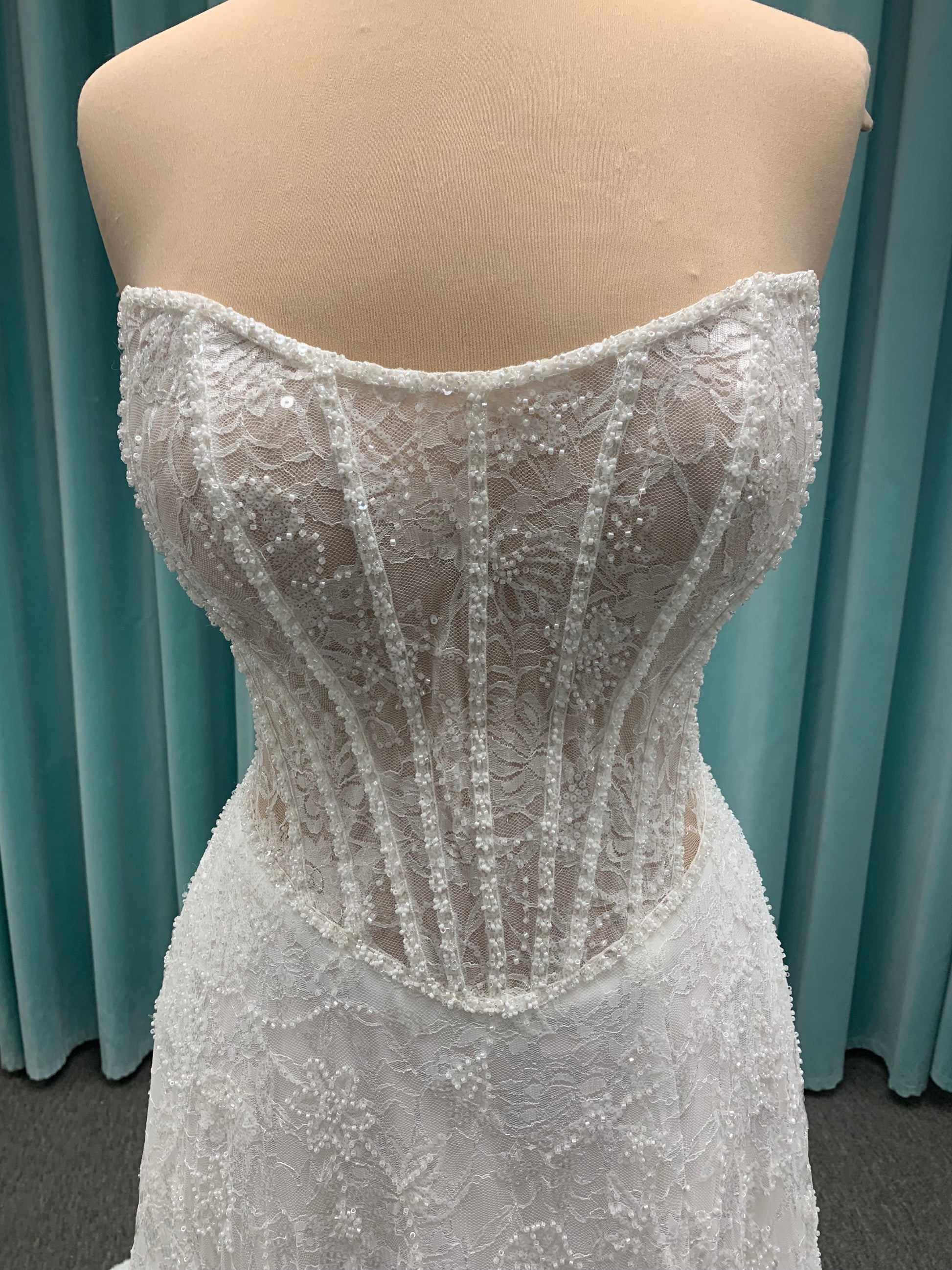 Essense of Australia D4176 strapless sparkling A-line wedding dress with basque waist and high slit