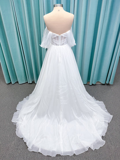Morilee 2910L Levana A-line wedding dress on mannequin with sweetheart strapless neckline, off-the-shoulder sleeves, draped organza bodice, and beaded waistband