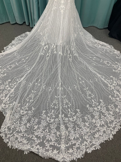 Shimmering lace fit-and-flare wedding dress with botanical appliqués, scoop neckline, and sheer lace train by Essense of Australia Style D4279
