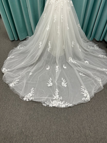 Off-the-shoulder lace A-line wedding dress with corset bodice, 3D floral appliqués, and glitter tulle skirt by Essense of Australia style D4360