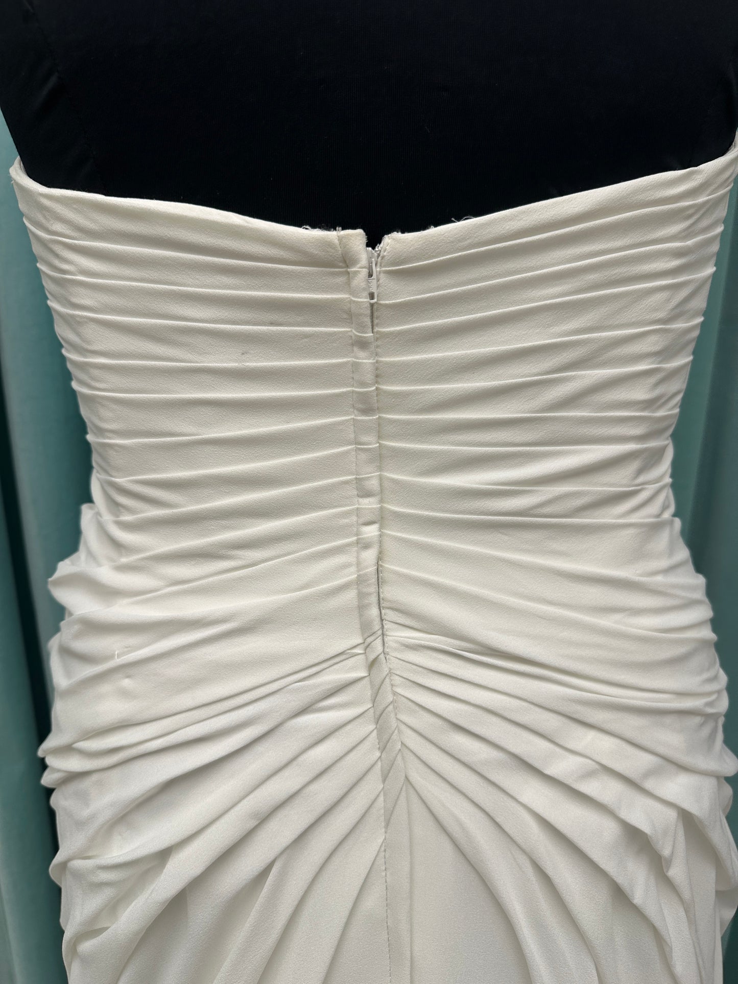 Plus size strapless chiffon A-line wedding dress with sweetheart neckline and draped bodice detail