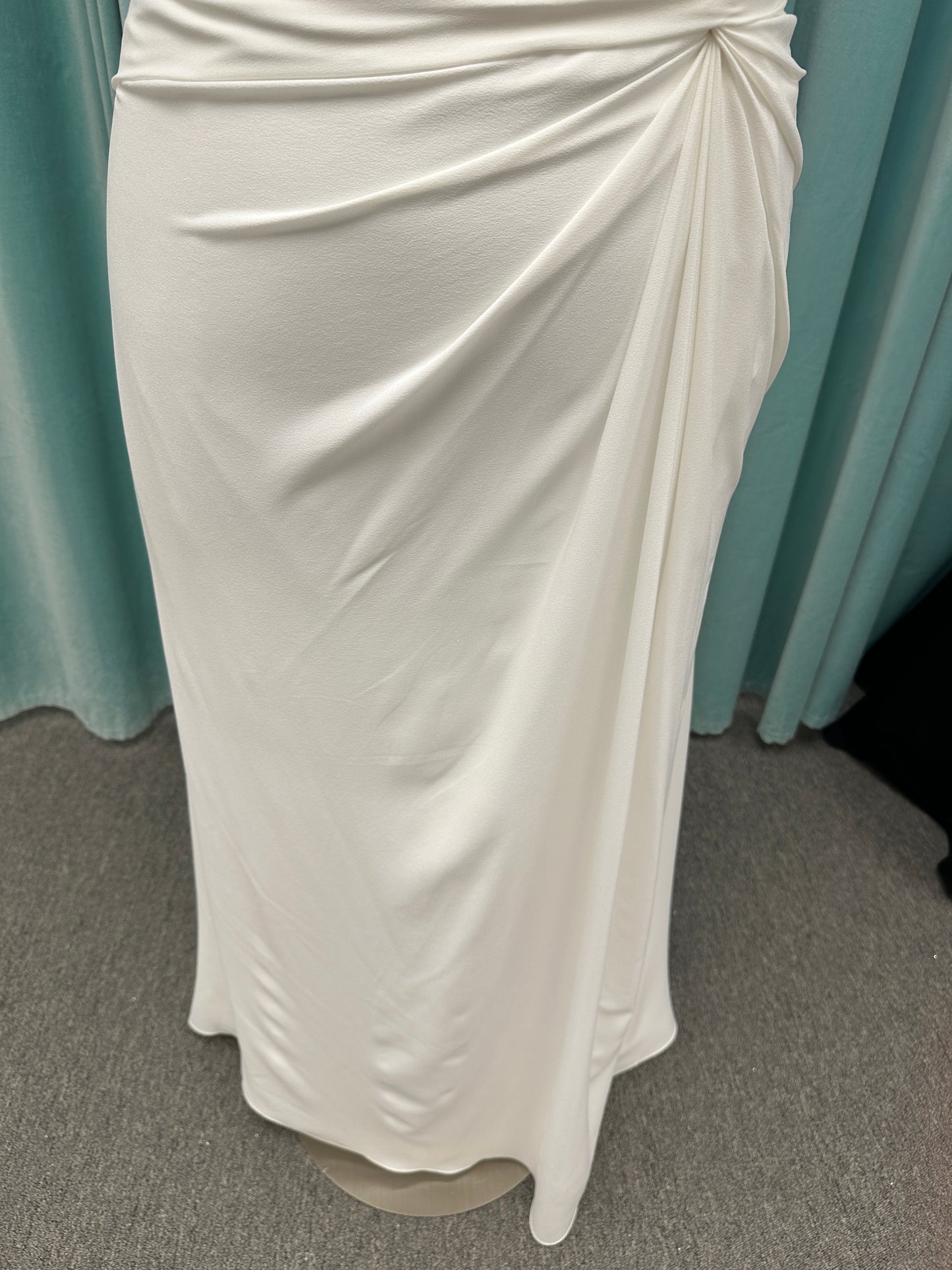 Plus size strapless chiffon A-line wedding dress with sweetheart neckline and draped bodice detail