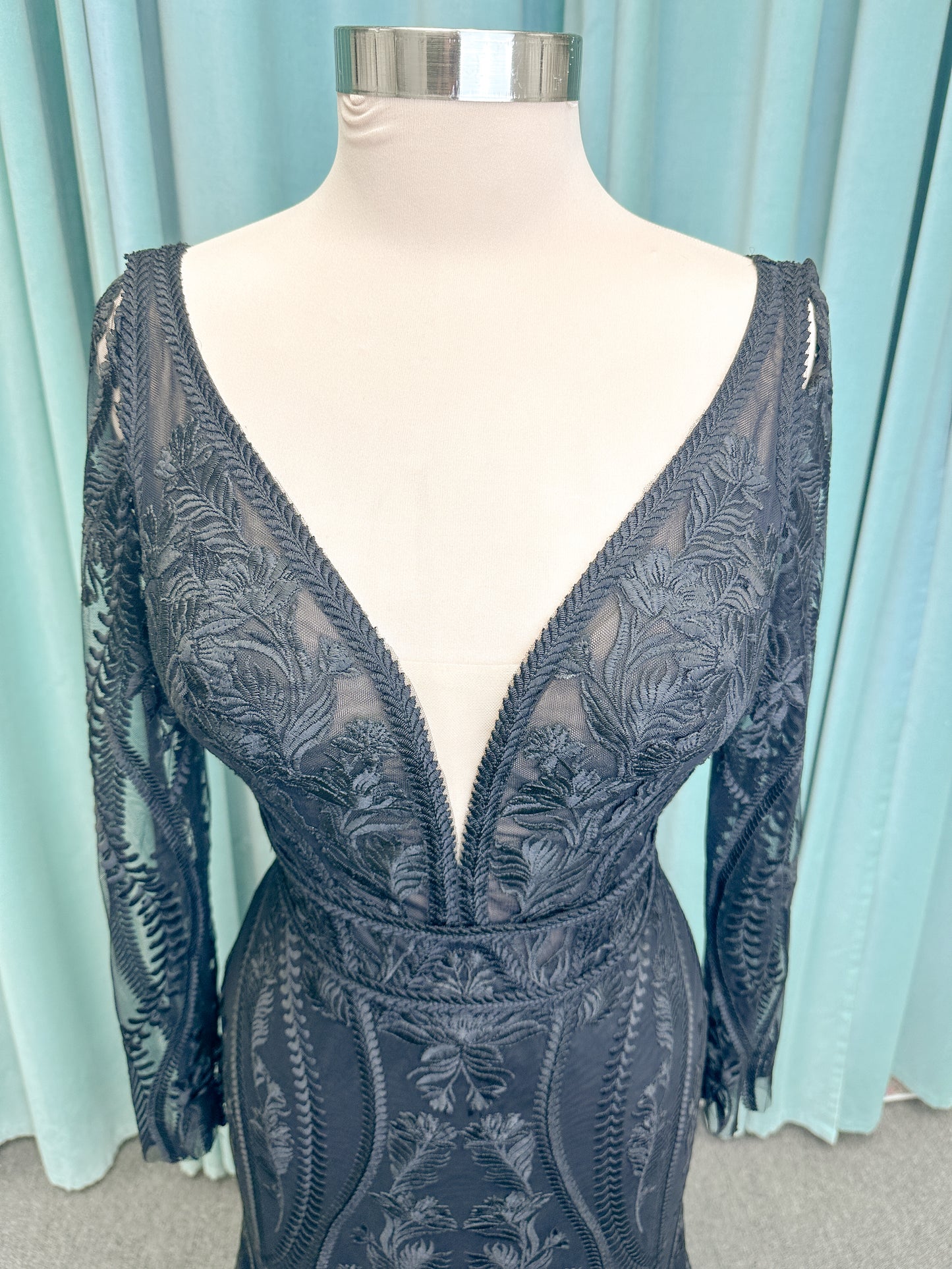 Morticia Mermaid Wedding Dress in Black, Size 12 — embroidered lace, plunging V-neckline, long illusion sleeves