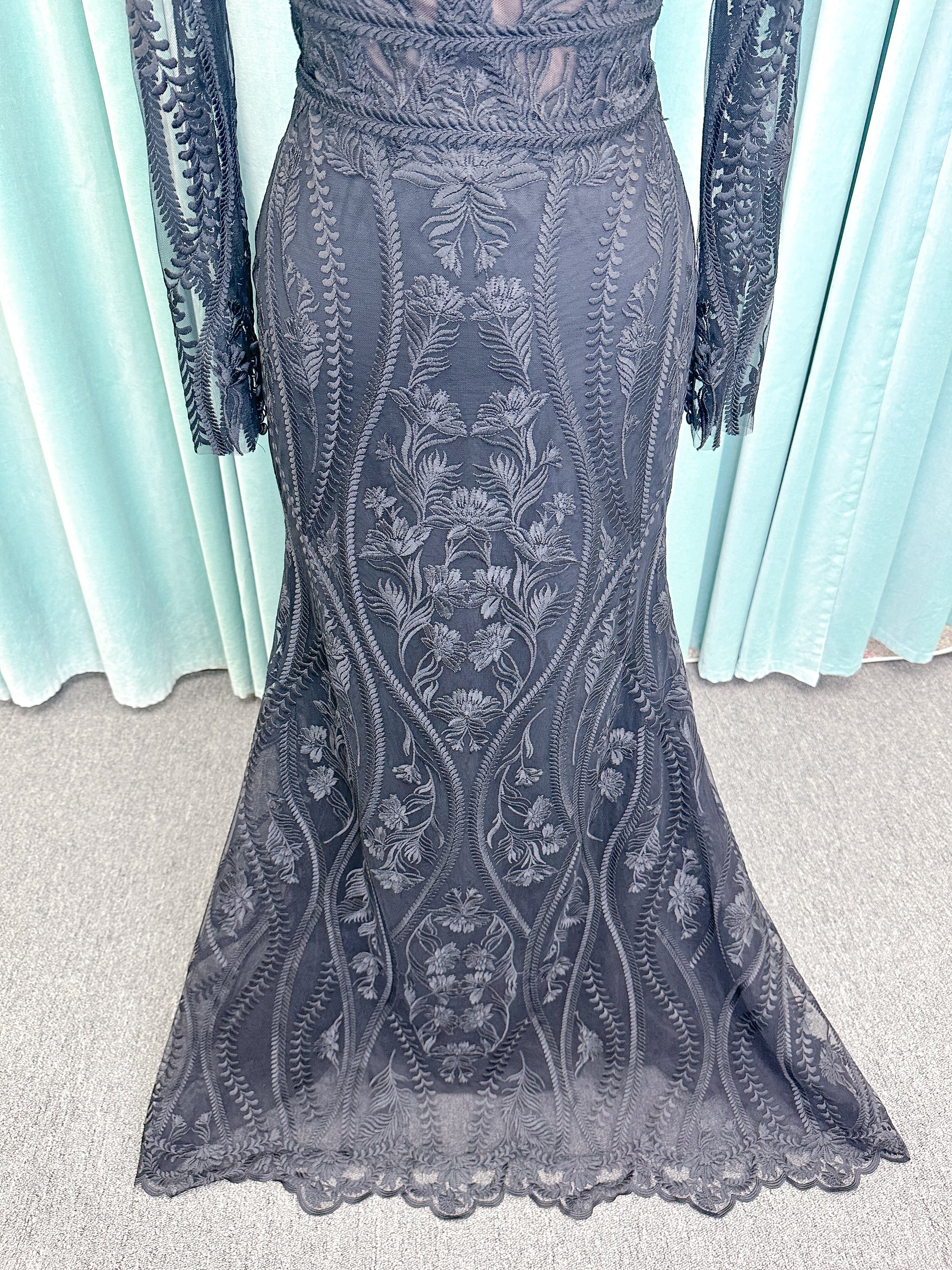 Morticia Mermaid Wedding Dress in Black, Size 12 — embroidered lace, plunging V-neckline, long illusion sleeves