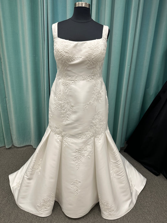 Plus size Mikado fit-and-flare wedding dress with square neckline, wide straps, low scoop back, and detachable oversized bow train by Stella York 8047