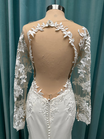 Long sleeve lace wedding dress with sheer illusion bodice and fitted skirt, featuring intricate floral lace and a soft train by Essense of Australia Style D3379
