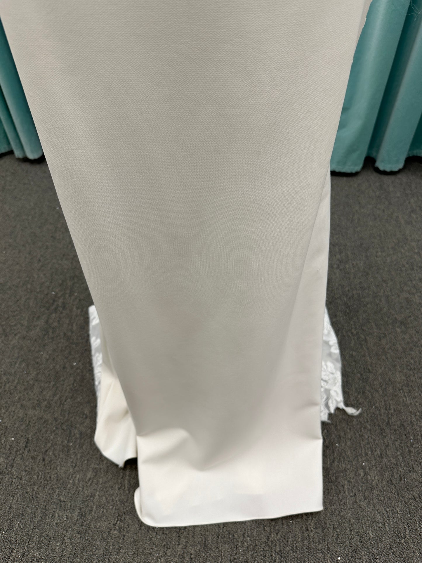 Long sleeve lace wedding dress with sheer illusion bodice and fitted skirt, featuring intricate floral lace and a soft train by Essense of Australia Style D3379