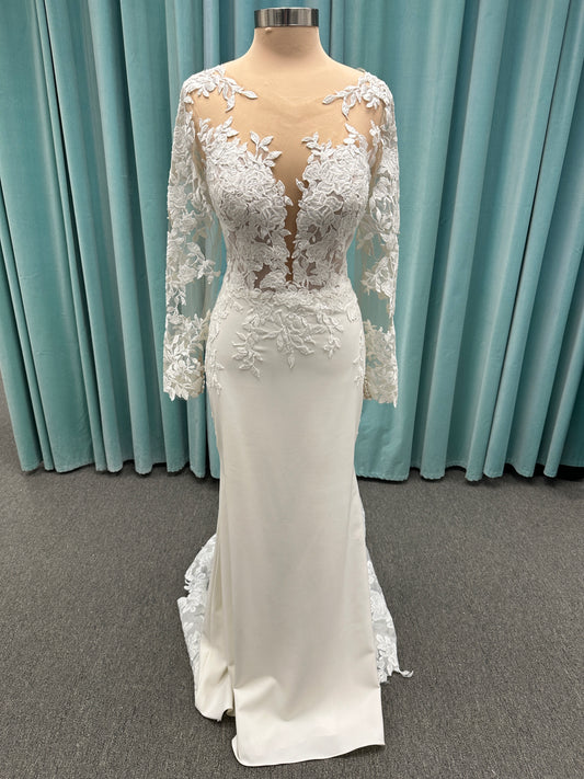 Long sleeve lace wedding dress with sheer illusion bodice and fitted skirt, featuring intricate floral lace and a soft train by Essense of Australia Style D3379