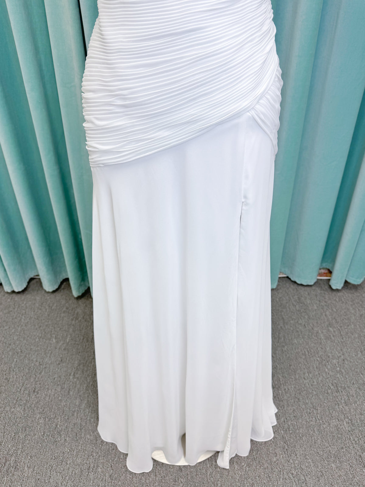 Morilee 15053 Parvati ballgown wedding dress on mannequin with draped chiffon bodice, plunging sweetheart neckline, and detachable off-the-shoulder sleeves