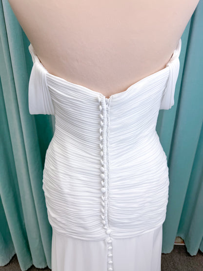 Morilee 15053 Parvati ballgown wedding dress on mannequin with draped chiffon bodice, plunging sweetheart neckline, and detachable off-the-shoulder sleeves
