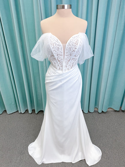 Morilee 1050008 Plie fit and flare wedding dress on mannequin with fluid draping and clean silhouette
