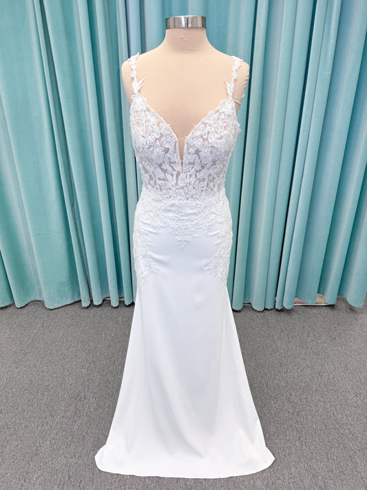 Morilee 2658 Raquel sheath wedding dress on mannequin with plunging neckline, frosted floral sparkle net bodice, crepe skirt, and keyhole back