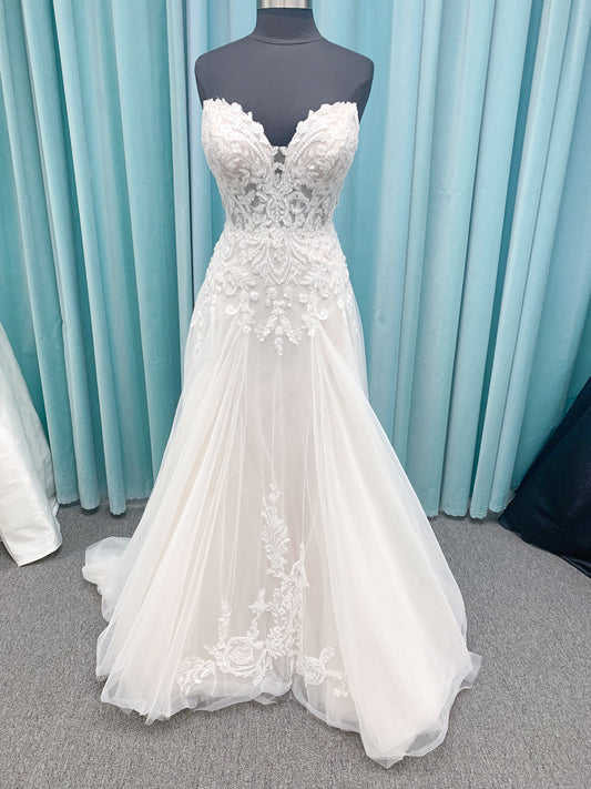 Morilee 2660 Regina A-line wedding dress with embroidered sweetheart neckline, matte sequins, drop waist, Chantilly lace tulle skirt, and lace-trimmed train.