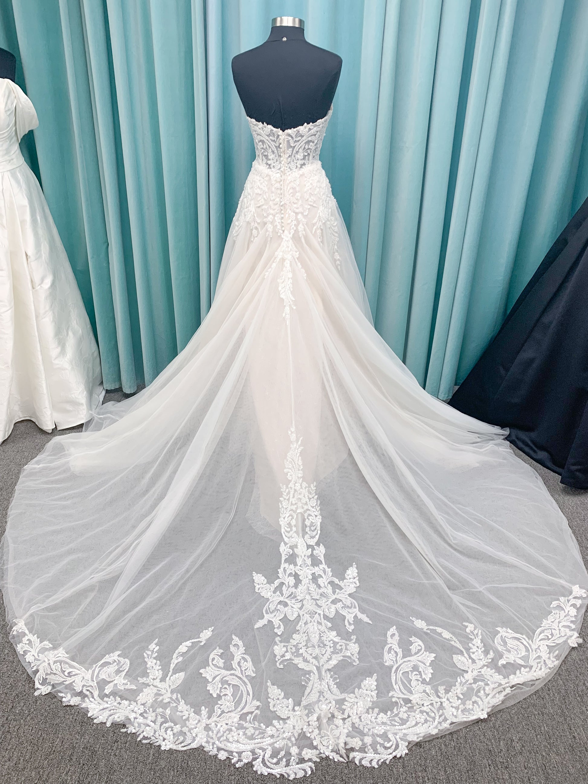 Morilee 2660 Regina A-line wedding dress with embroidered sweetheart neckline, matte sequins, drop waist, Chantilly lace tulle skirt, and lace-trimmed train.
