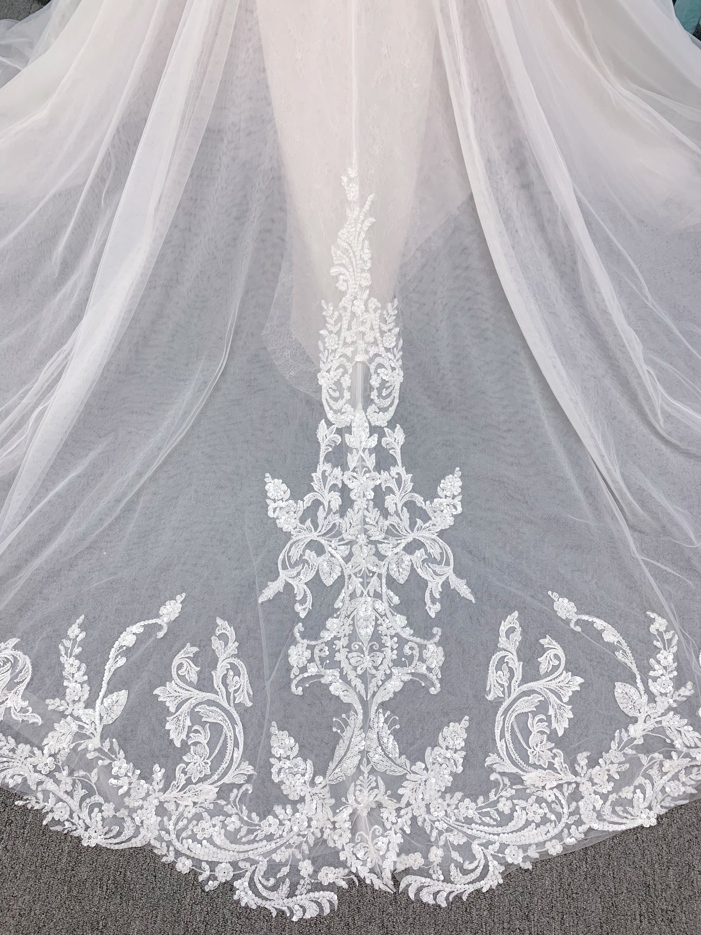 Morilee 2660 Regina A-line wedding dress with embroidered sweetheart neckline, matte sequins, drop waist, Chantilly lace tulle skirt, and lace-trimmed train.
