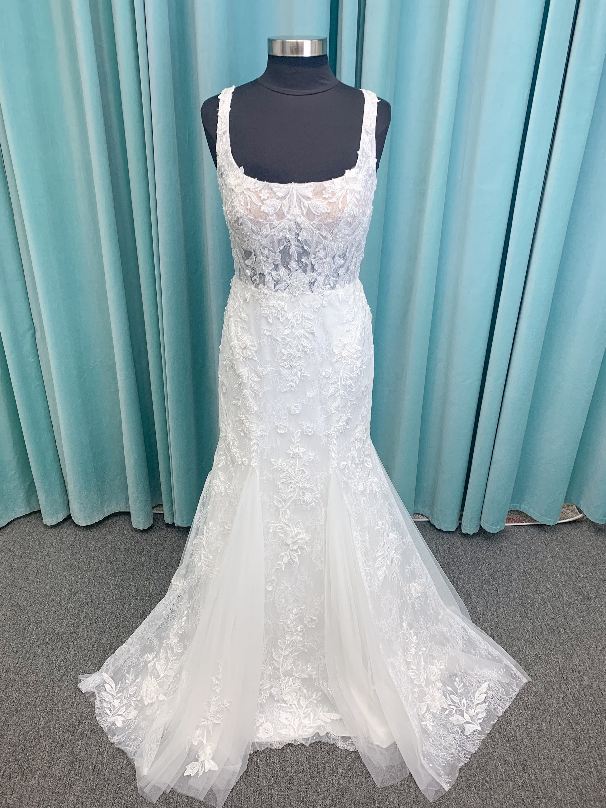 Morilee 2650 Rhea fit and flare wedding dress with square neckline, 3D beaded floral lace over sparkle tulle, corset boning, keyhole back, and godet skirt insets.