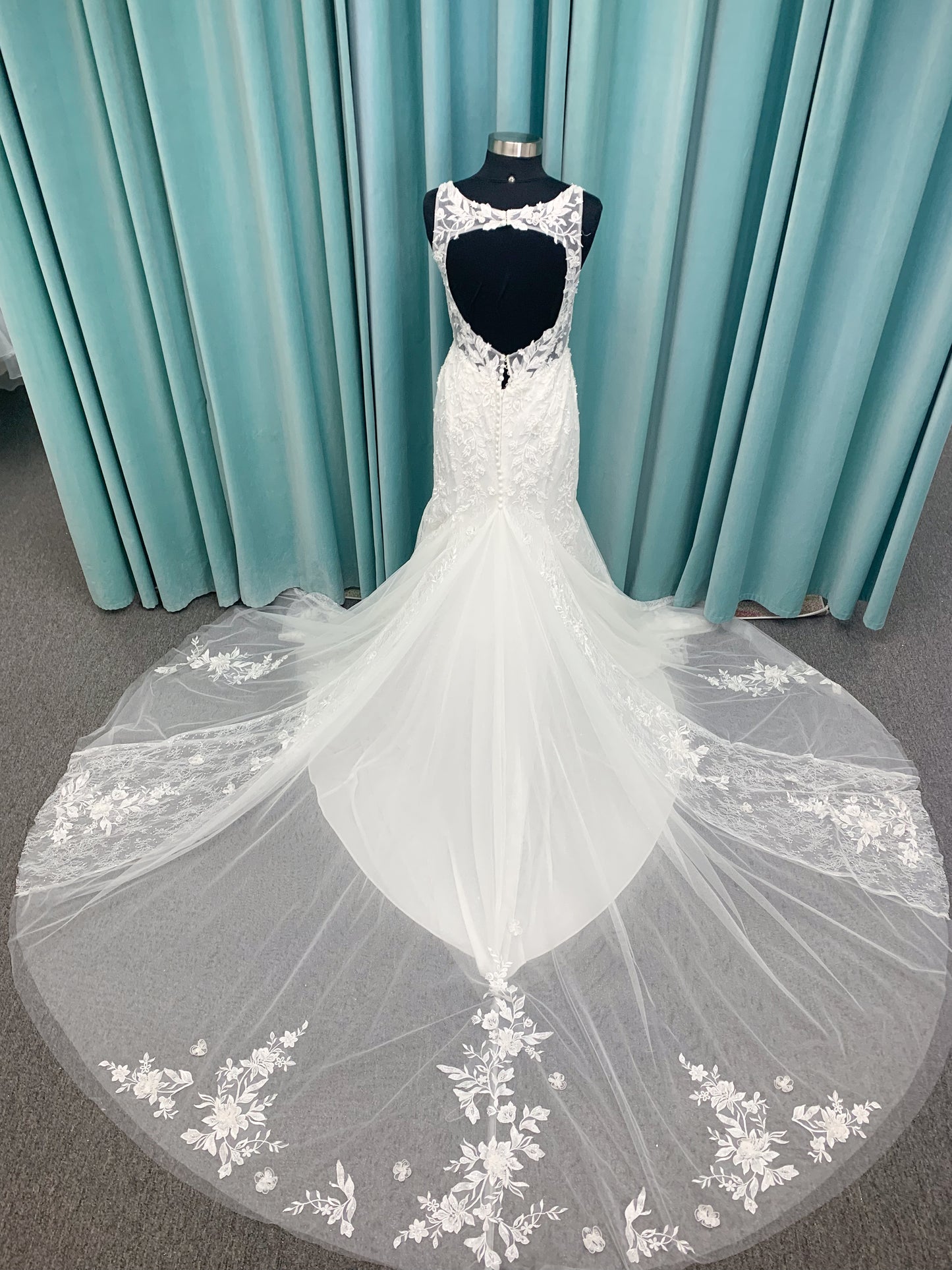 Morilee 2650 Rhea fit and flare wedding dress with square neckline, 3D beaded floral lace over sparkle tulle, corset boning, keyhole back, and godet skirt insets.