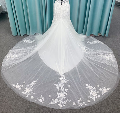 Morilee 2650 Rhea fit and flare wedding dress with square neckline, 3D beaded floral lace over sparkle tulle, corset boning, keyhole back, and godet skirt insets.