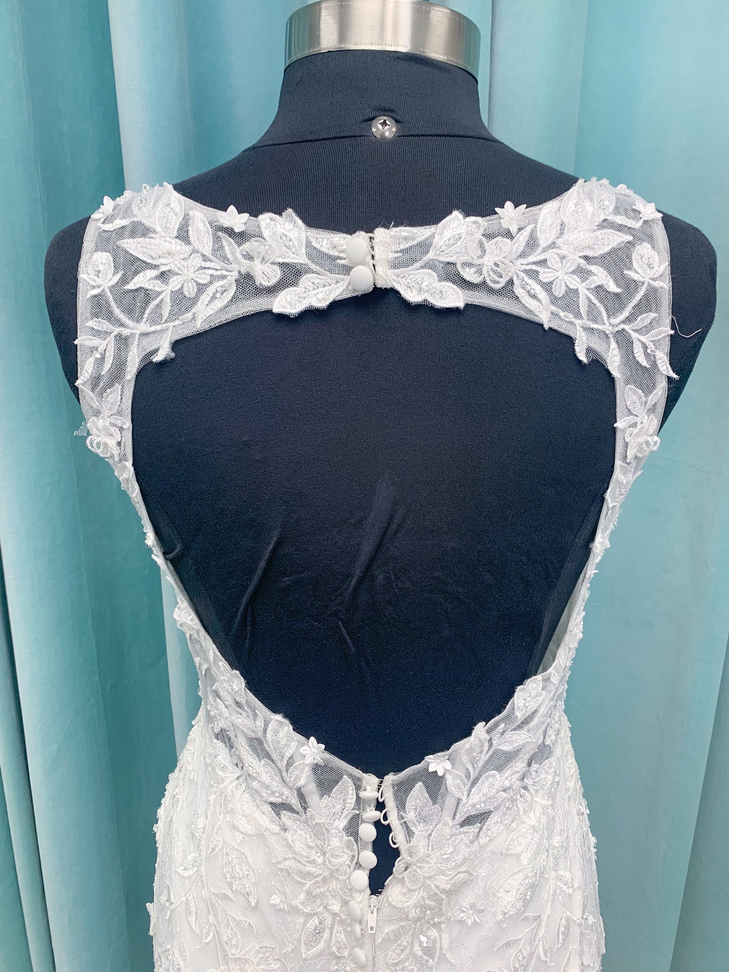 Morilee 2650 Rhea fit and flare wedding dress with square neckline, 3D beaded floral lace over sparkle tulle, corset boning, keyhole back, and godet skirt insets.