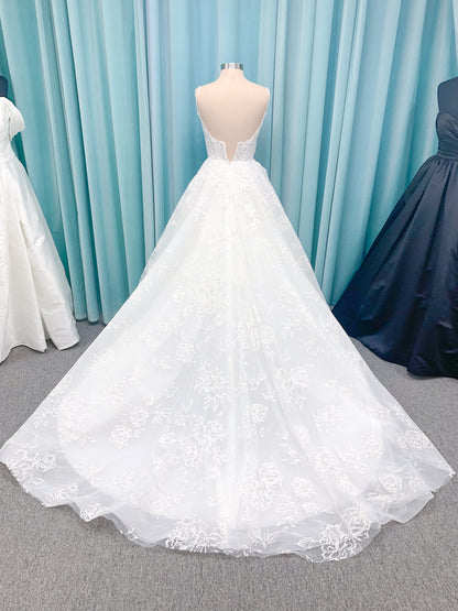 Morilee 2988 Rosie ball gown wedding dress in rose-printed organza over glitter tulle with V-neck, thin straps, structured boning, and voluminous sweeping train.