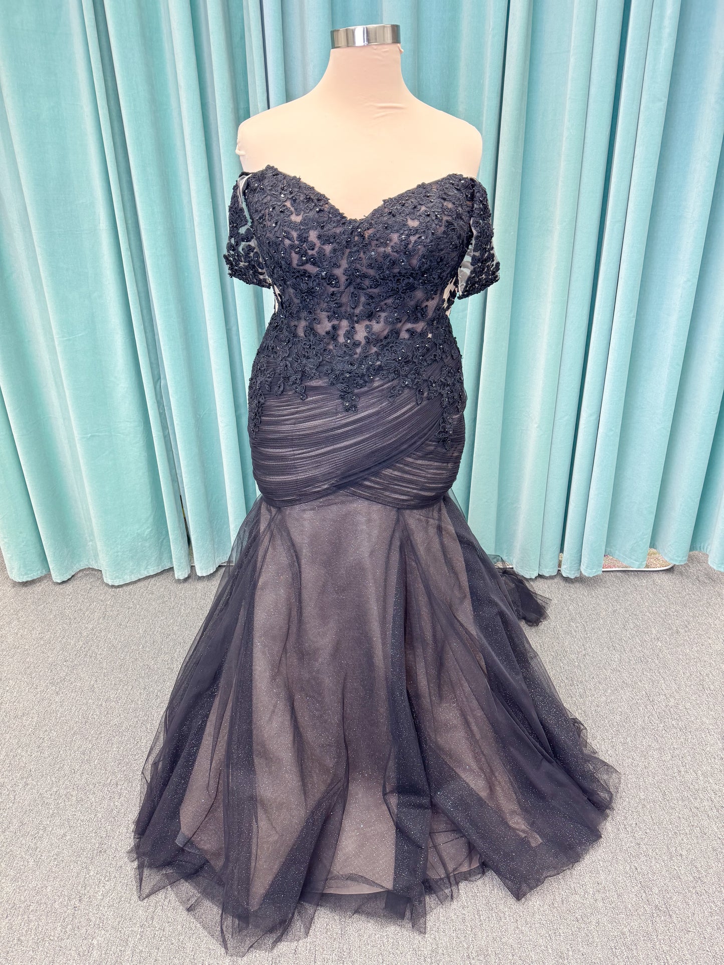 Morilee 4467 Rowena fit and flare wedding dress on mannequin with sheer corset bodice, frosted lace appliques, sweetheart neckline, and detachable off-the-shoulder sleeves