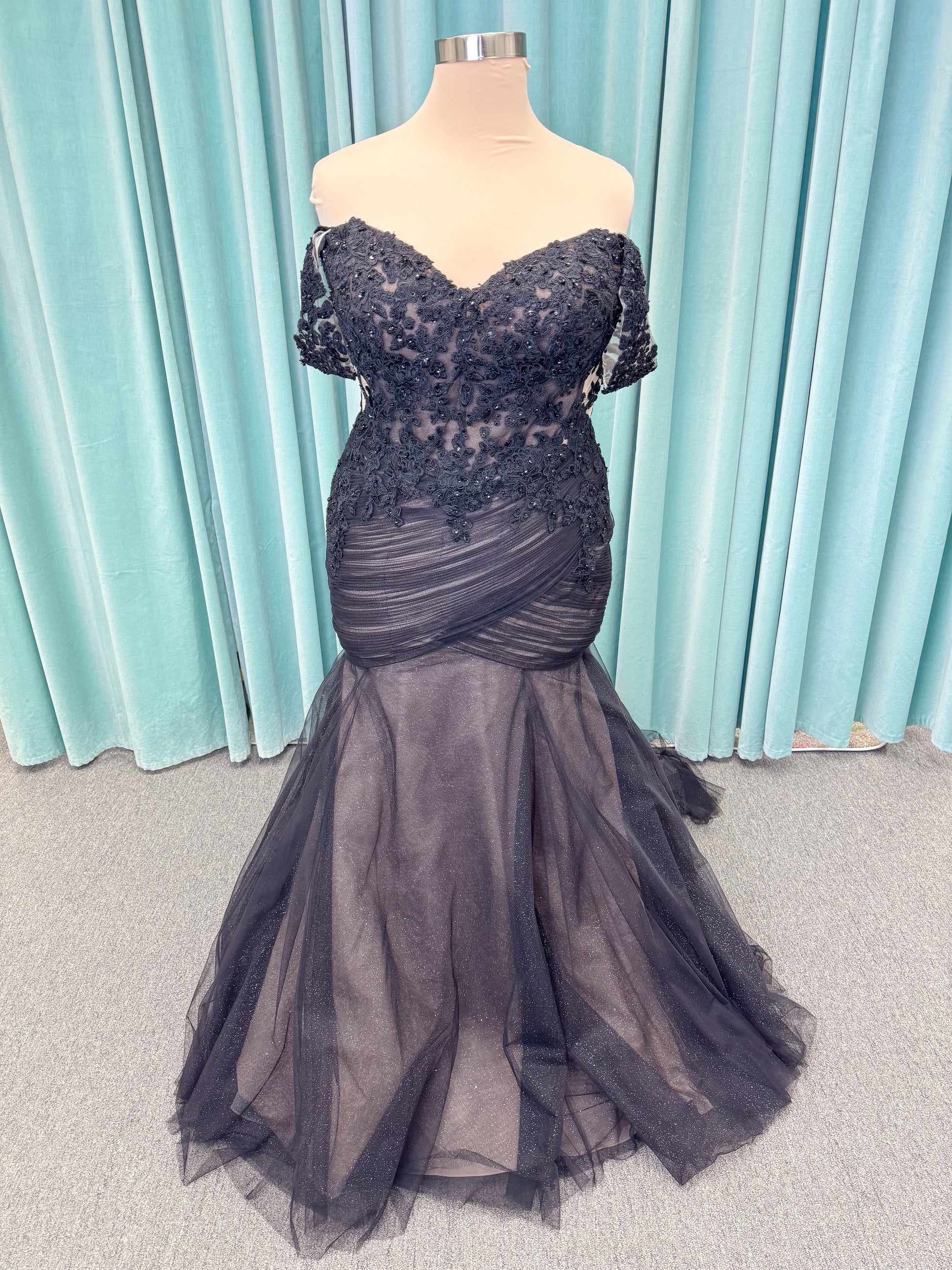 Morilee 4467 Rowena fit and flare wedding dress on mannequin with sheer corset bodice, frosted lace appliques, sweetheart neckline, and detachable off-the-shoulder sleeves