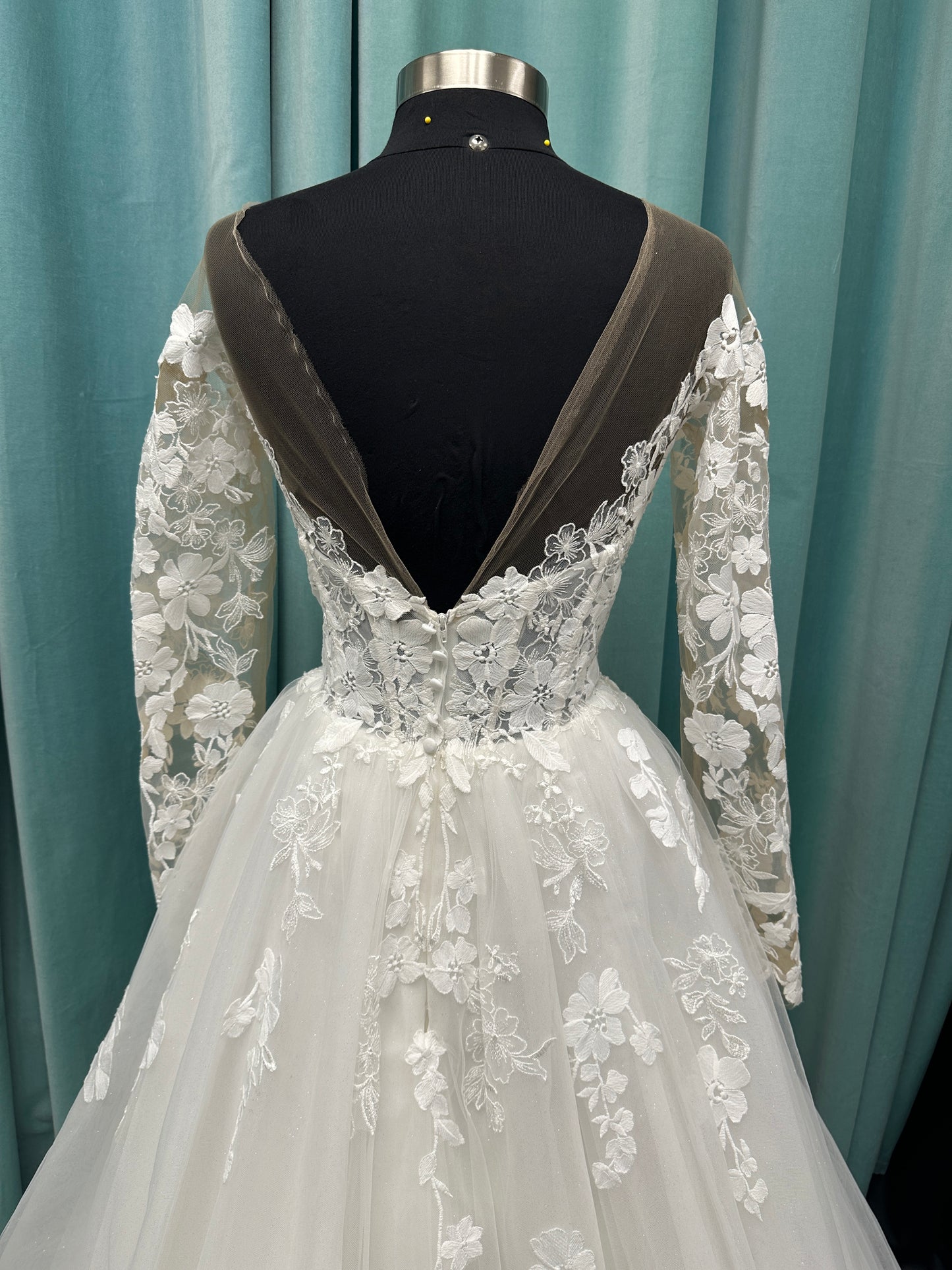 Stella York Style 8012 lace and tulle ballgown wedding dress with sheer sweetheart bodice, off-the-shoulder long lace sleeves, and full princess skirt