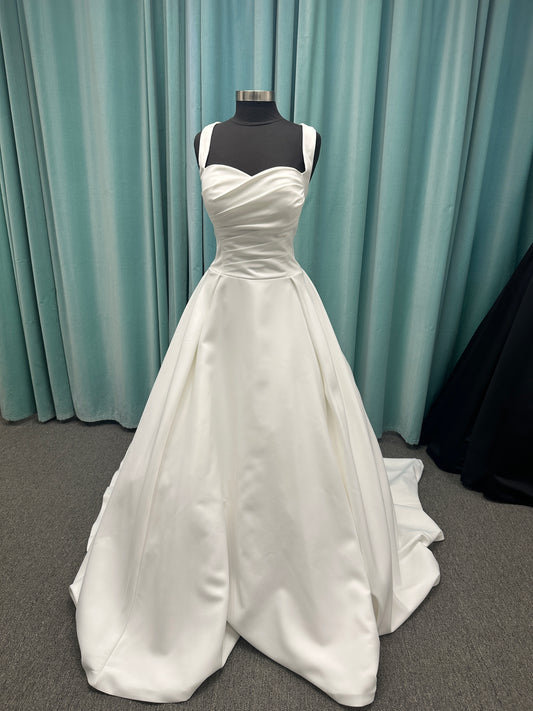 Stella York SY8178 Timeless matte satin A-line wedding dress with a sweetheart neckline and ruched bodice, featuring wide straps, a structured waist, and a flowing skirt with hidden pockets for a clean, elegant silhouette