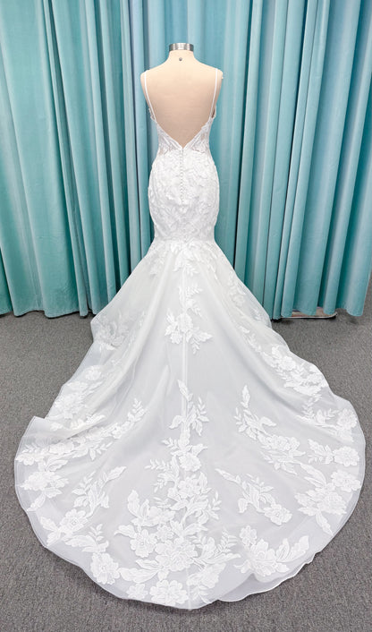 Morilee 2904 Selene fit and flare wedding dress on mannequin with spaghetti straps, plunge neckline, illusion side cutouts, and open back