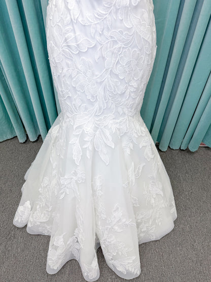 Morilee 2904 Selene fit and flare wedding dress on mannequin with spaghetti straps, plunge neckline, illusion side cutouts, and open back