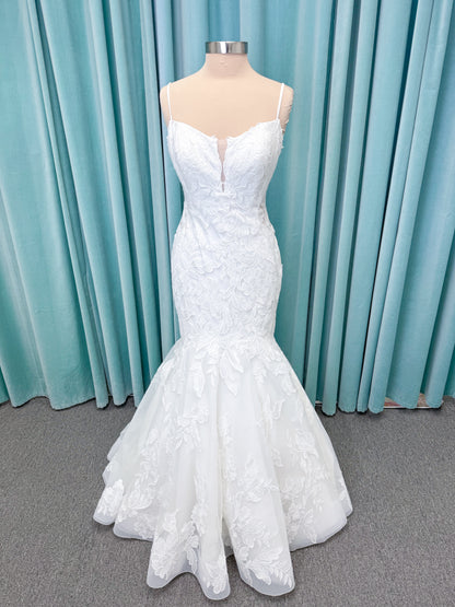 Morilee 2904 Selene fit and flare wedding dress on mannequin with spaghetti straps, plunge neckline, illusion side cutouts, and open back