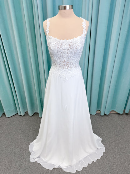 Morilee 15108 Senna boho A-line wedding dress on mannequin with square neckline, 3D floral lace bodice, and flowing chiffon skirt
