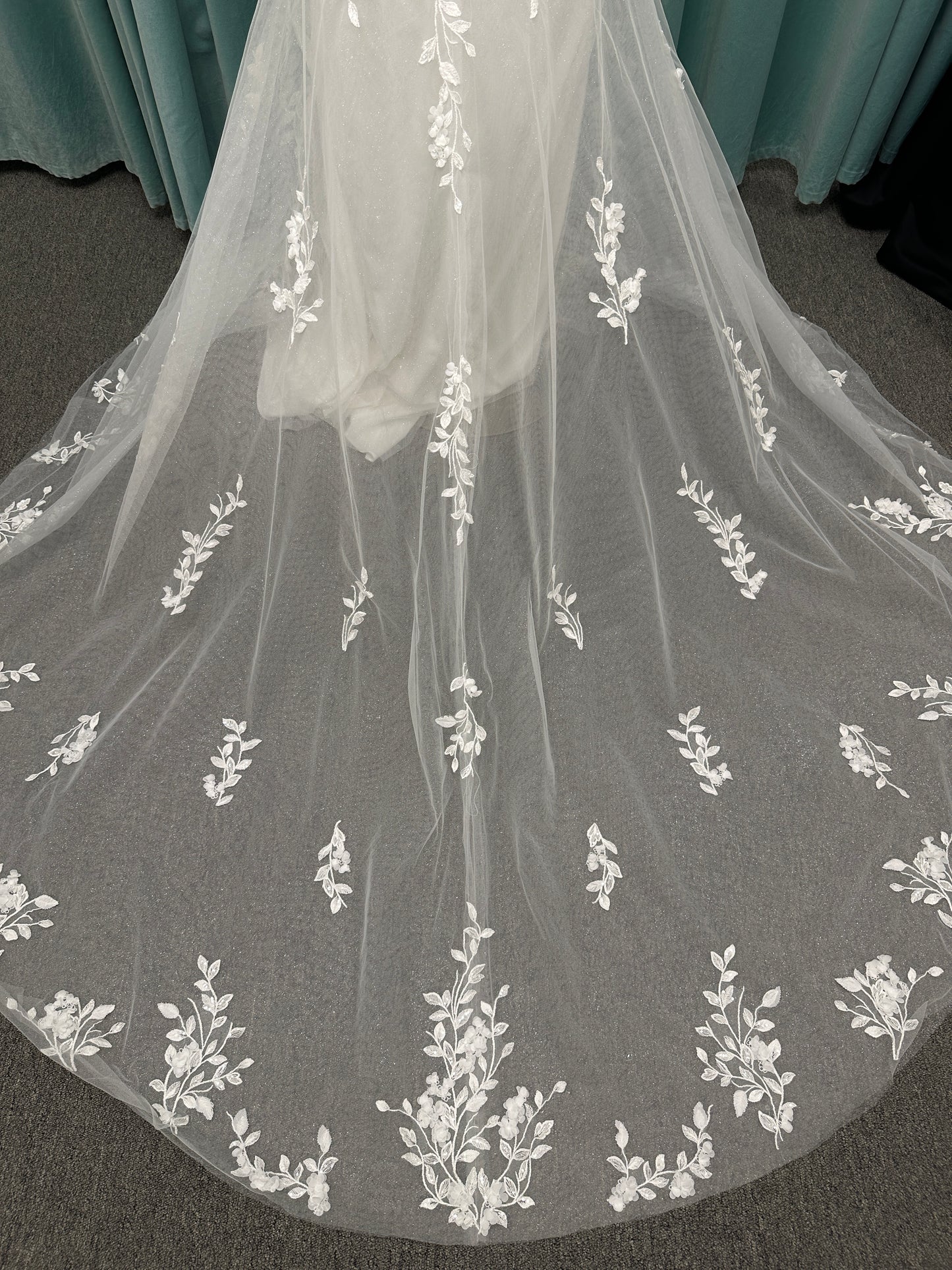 Stella York SY8157 glitter tulle fit-and-flare wedding dress with plunge neckline and floral lace appliqués