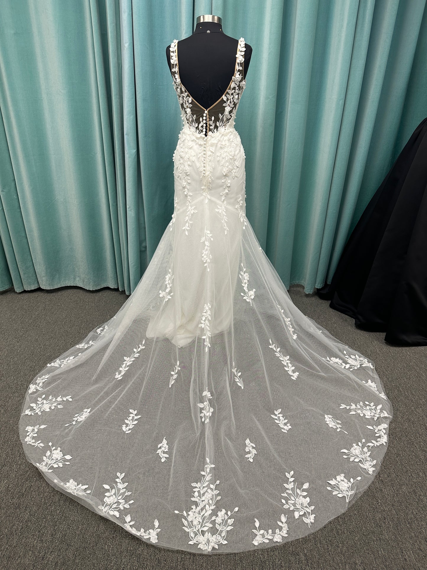 Stella York SY8157 glitter tulle fit-and-flare wedding dress with plunge neckline and floral lace appliqués