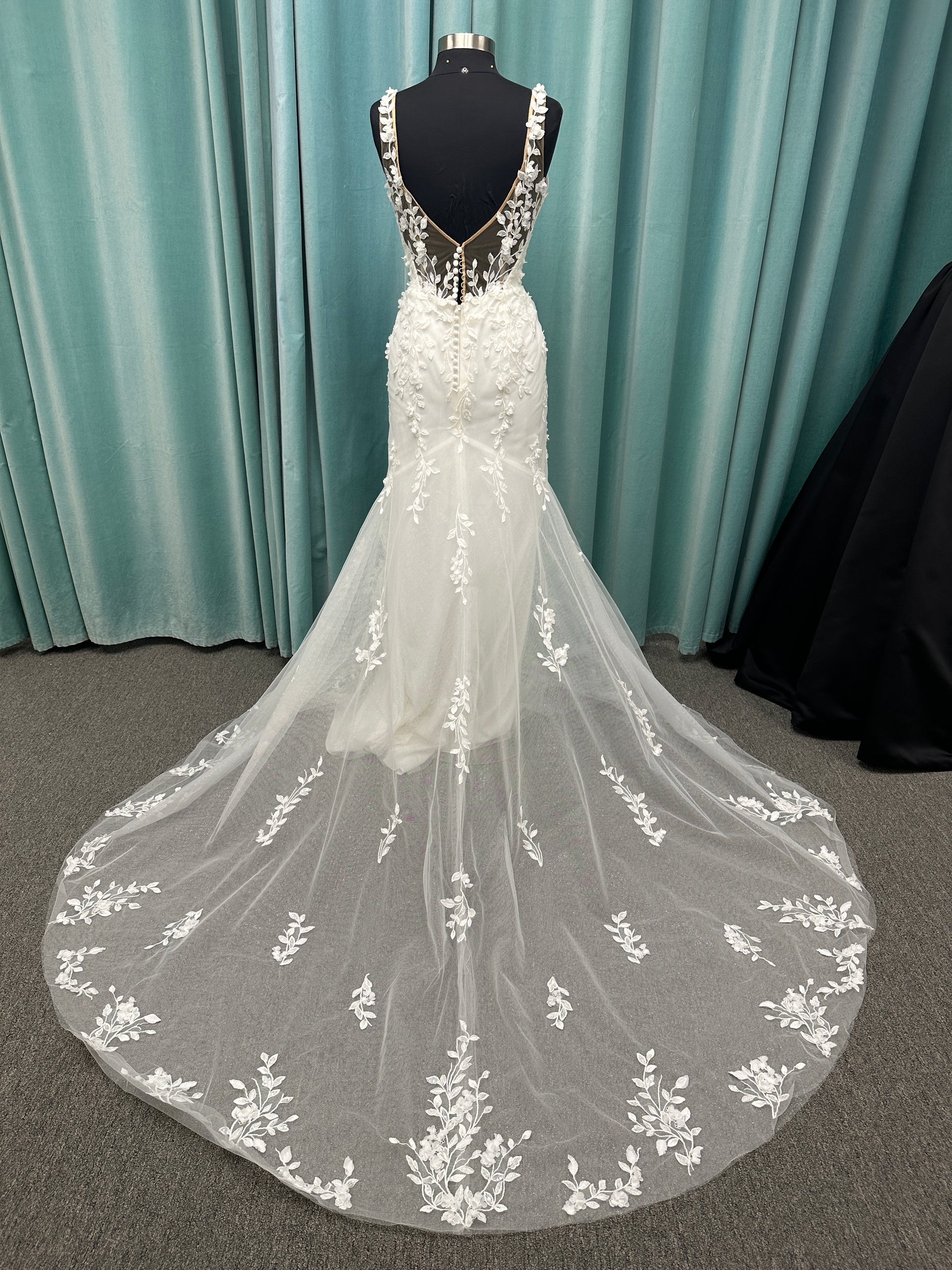 Stella York SY8157 glitter tulle fit-and-flare wedding dress with plunge neckline and floral lace appliqués