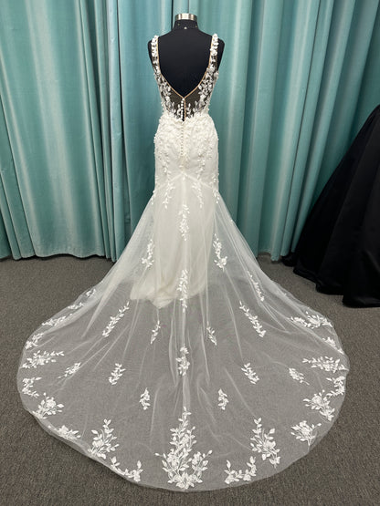 Stella York SY8157 glitter tulle fit-and-flare wedding dress with plunge neckline and floral lace appliqués