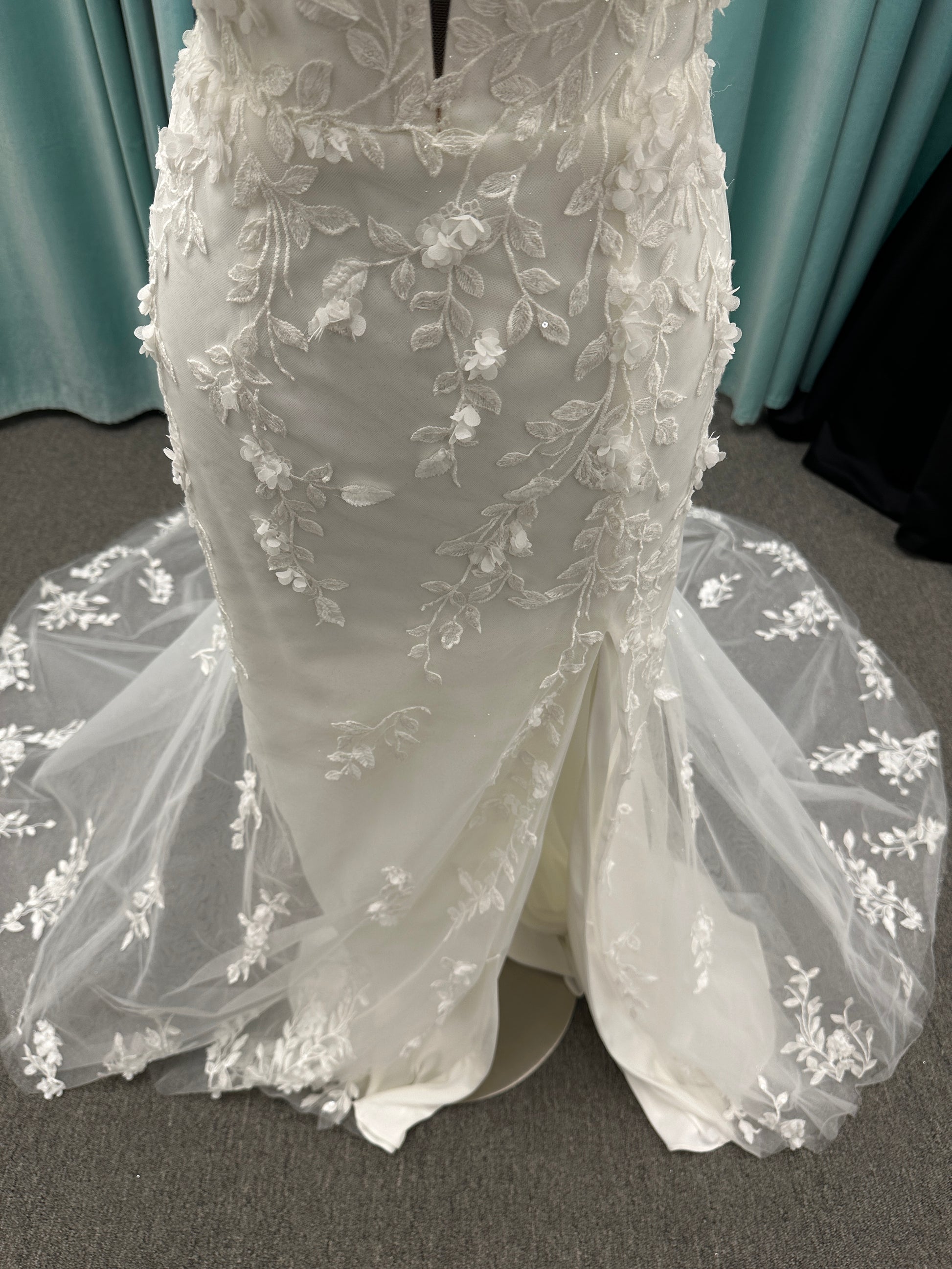 Stella York SY8157 glitter tulle fit-and-flare wedding dress with plunge neckline and floral lace appliqués