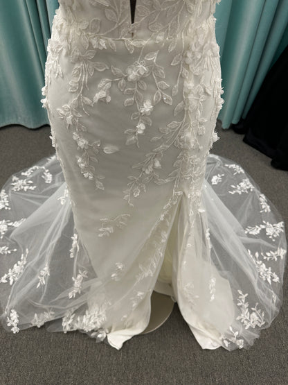Stella York SY8157 glitter tulle fit-and-flare wedding dress with plunge neckline and floral lace appliqués